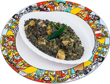 Gomen be Dinch: greens and potatoes served with injera.
