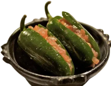 Green Karya Sineg peppers filled with vegetables.