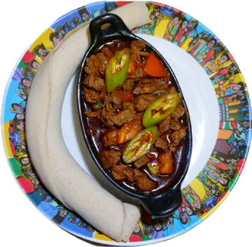 Yeawaze Tibs with green peppers and injera.